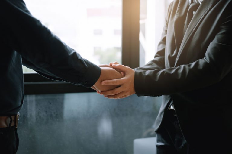 business-people-holding-hands